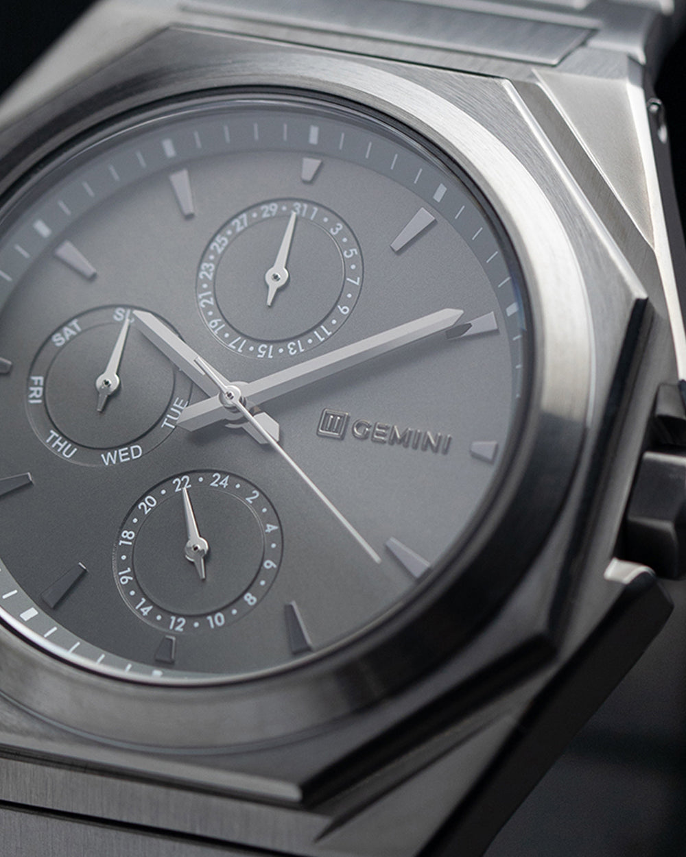 42mm full stainless steel watch with dark grey finish and silver details