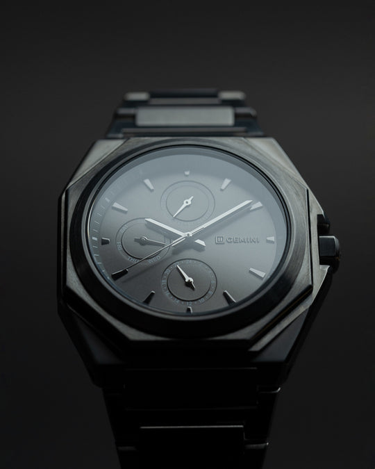 42mm full stainless steel watch with dark grey finish and silver details