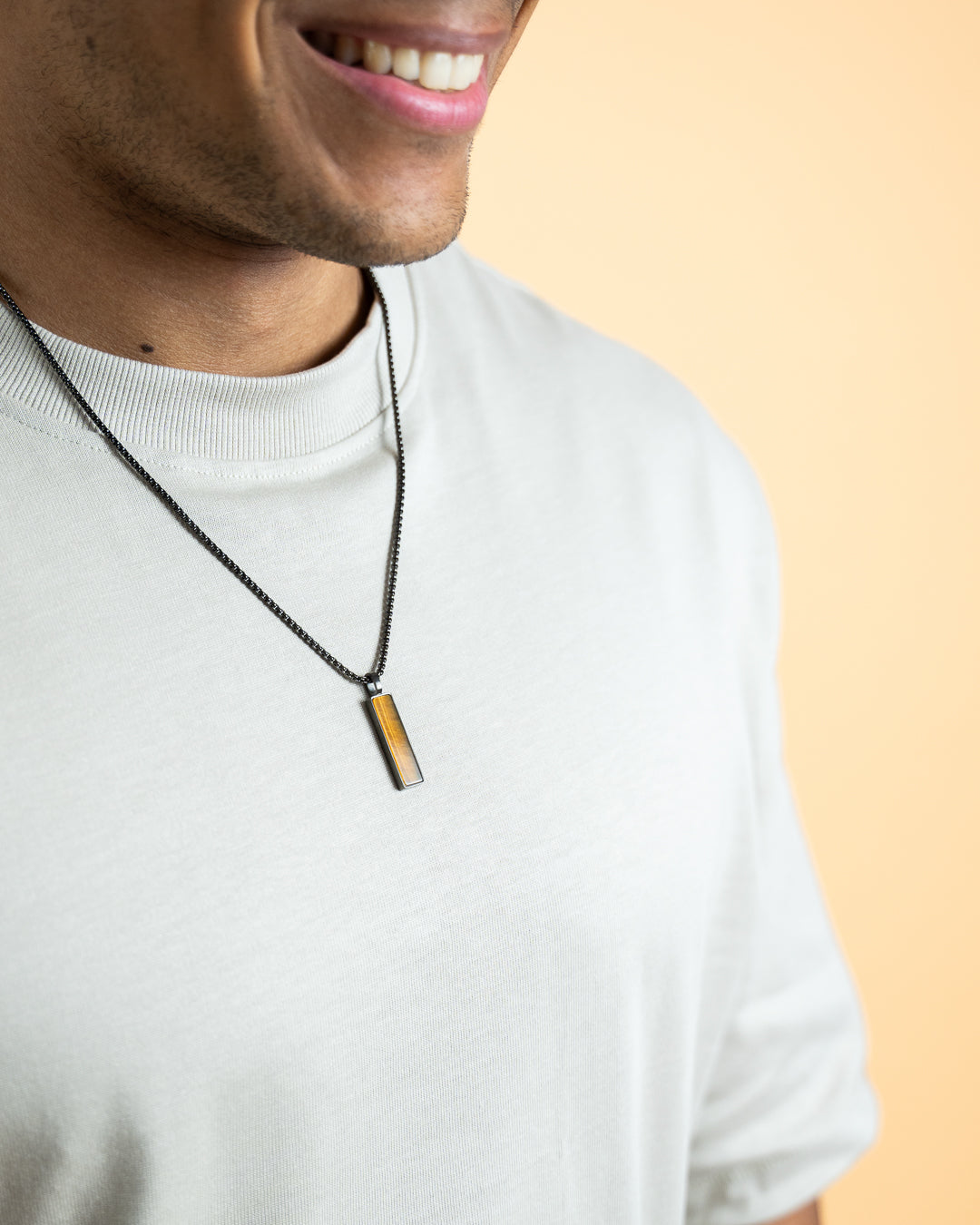 Black stainless steel necklace with a Tiger Eye stone