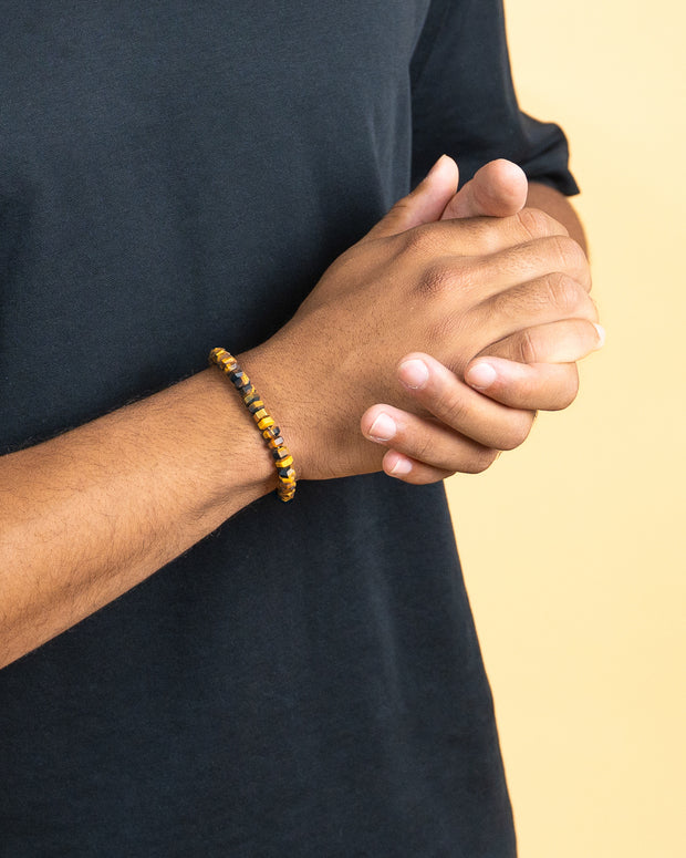 Exclusive bracelet with hand-cut Tiger Eye stone and 18k gold plating