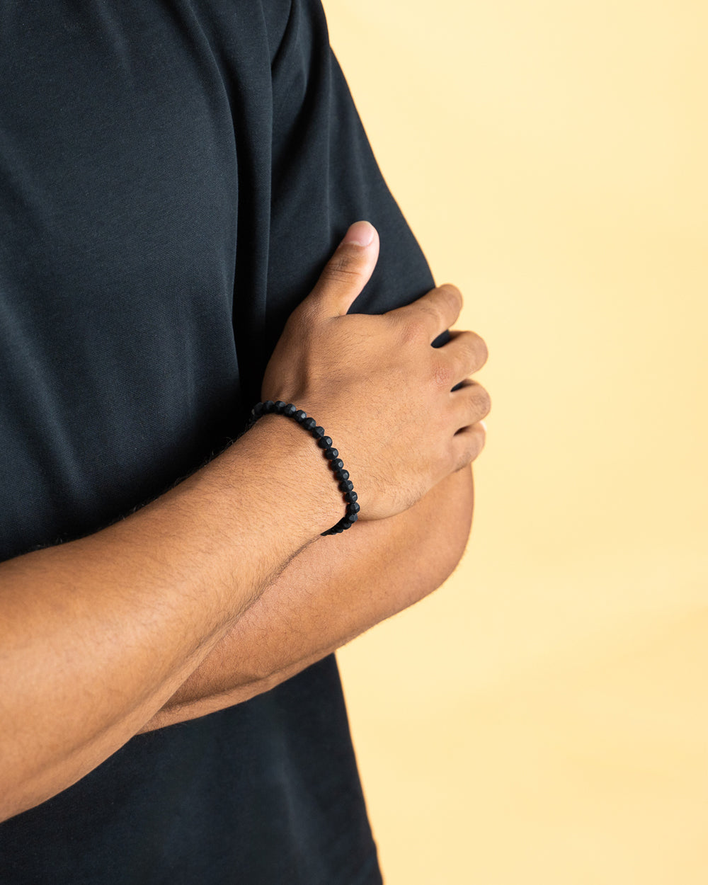 Bracelet with 6mm matte Black Agate stone and titanium element