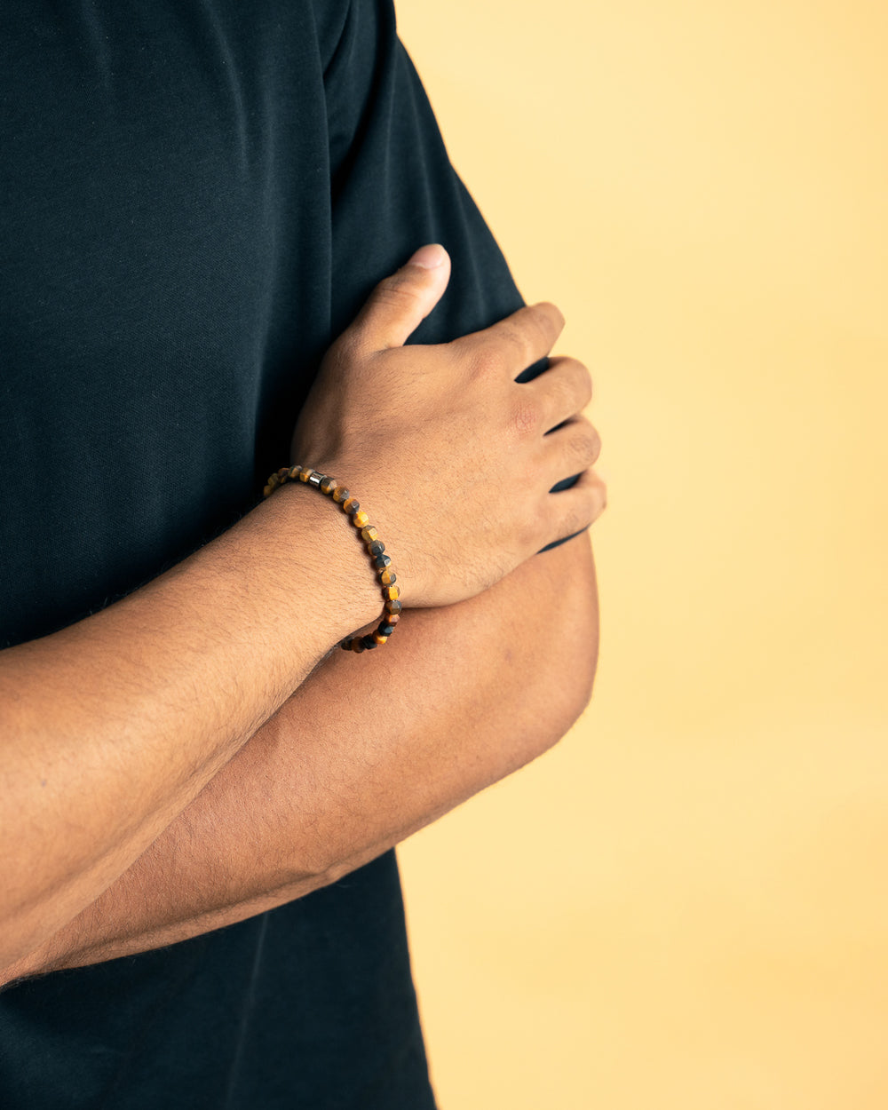 Bracelet with 6mm matte Tiger Eye stone and titanium element