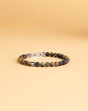 Bracelet with 6mm matte Tiger Eye stone and titanium element