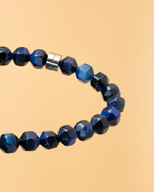 Bracelet with 6mm blue Tiger Eye stone and titanium element