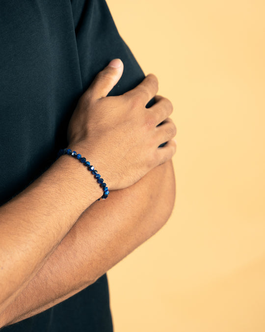 Bracelet with 6mm blue Tiger Eye stone and titanium element