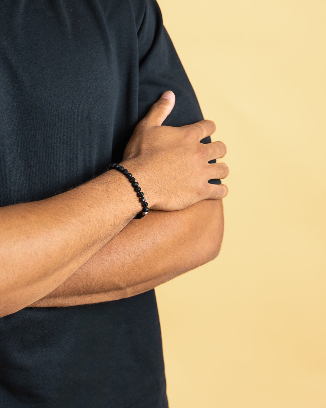 Bracelet with 6mm black Lava stone and titanium element