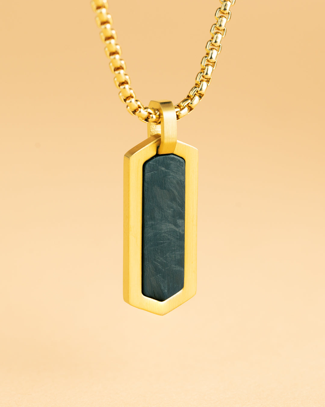 Gold-plated stainless steel necklace with a forged carbon finish