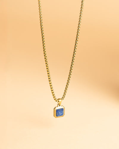 Collier Titane/acier avec une finition en or 18 carats et pierre Lapis Lazuli