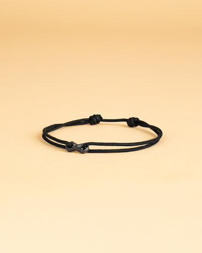 Bracelet en nylon noir de 1,5 mm avec un signe d'infini en titane