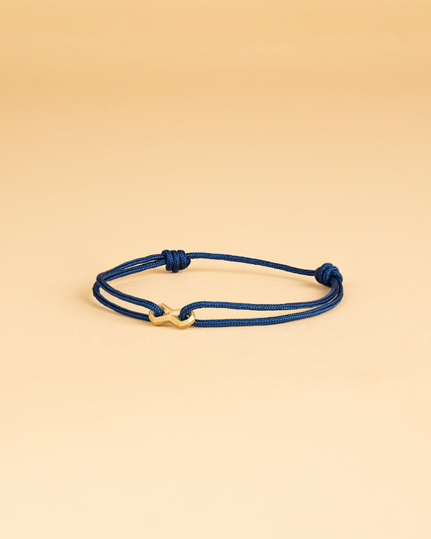 1,5 mm blauwe nylon armband met een verguld Infinity-teken