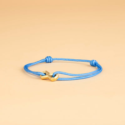 Bracelet en nylon bleu clair de 1,5 mm avec un signe Infinity en titane