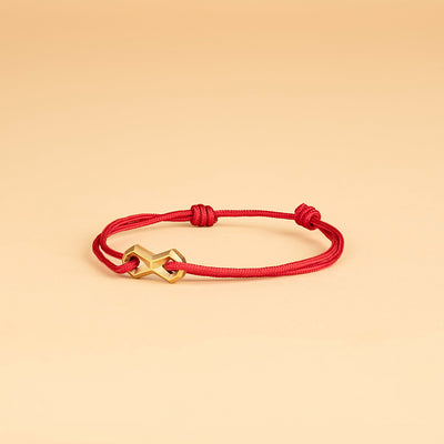 Bracelet en nylon rouge de 1,5 mm avec un signe d'infini en titane