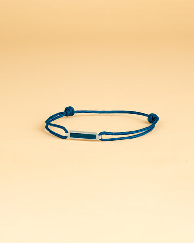 Bracelet en nylon bleu 1,5 mm avec une pierre Oeil de Tigre Bleu en titane