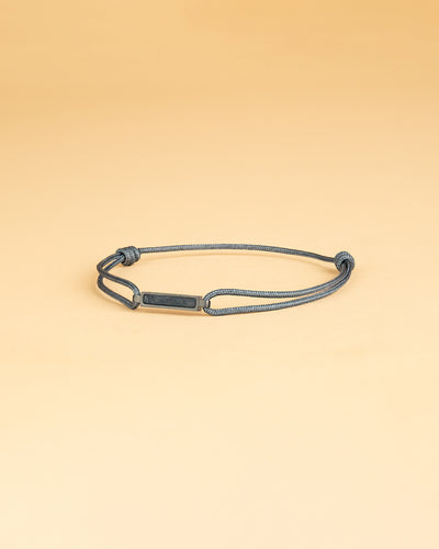 1.5mm Grey nylon bracelet with a carbon fiber element