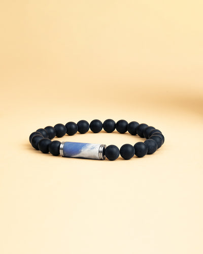 Bracelet perlé de 8mm avec une belle pierre bleue Jeremejevite